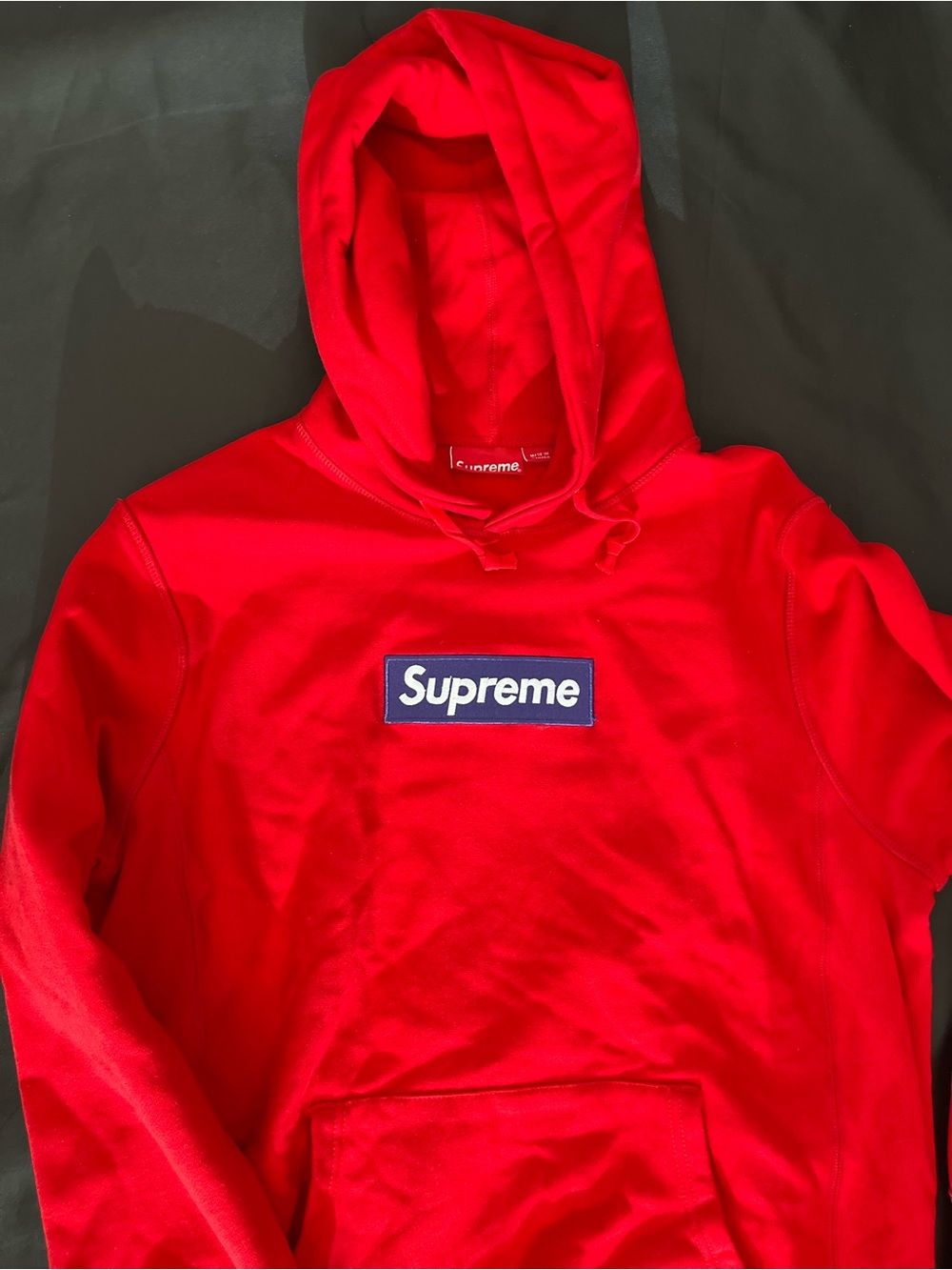Supreme Red Pullover Hoodie with Navy/White Tag